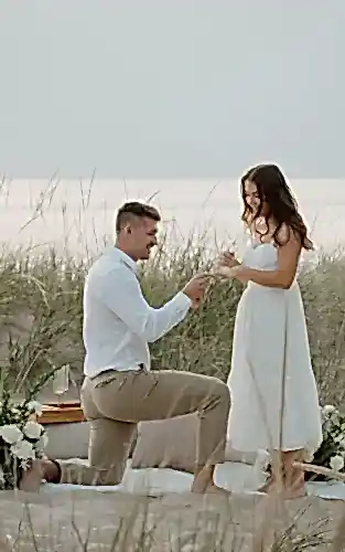 engagement photo ideas proposal moment on the beach special date girl and boy brilliantearth