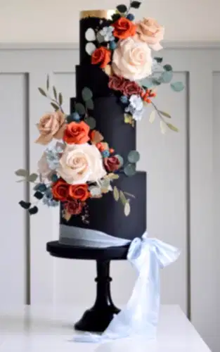 wedding cake designers total black wedding decor with terracotta palette flowers cottonandcrumbs